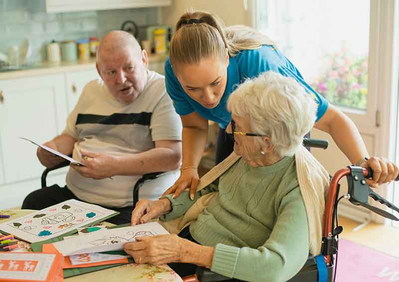 A support worker helping the NDIS participant